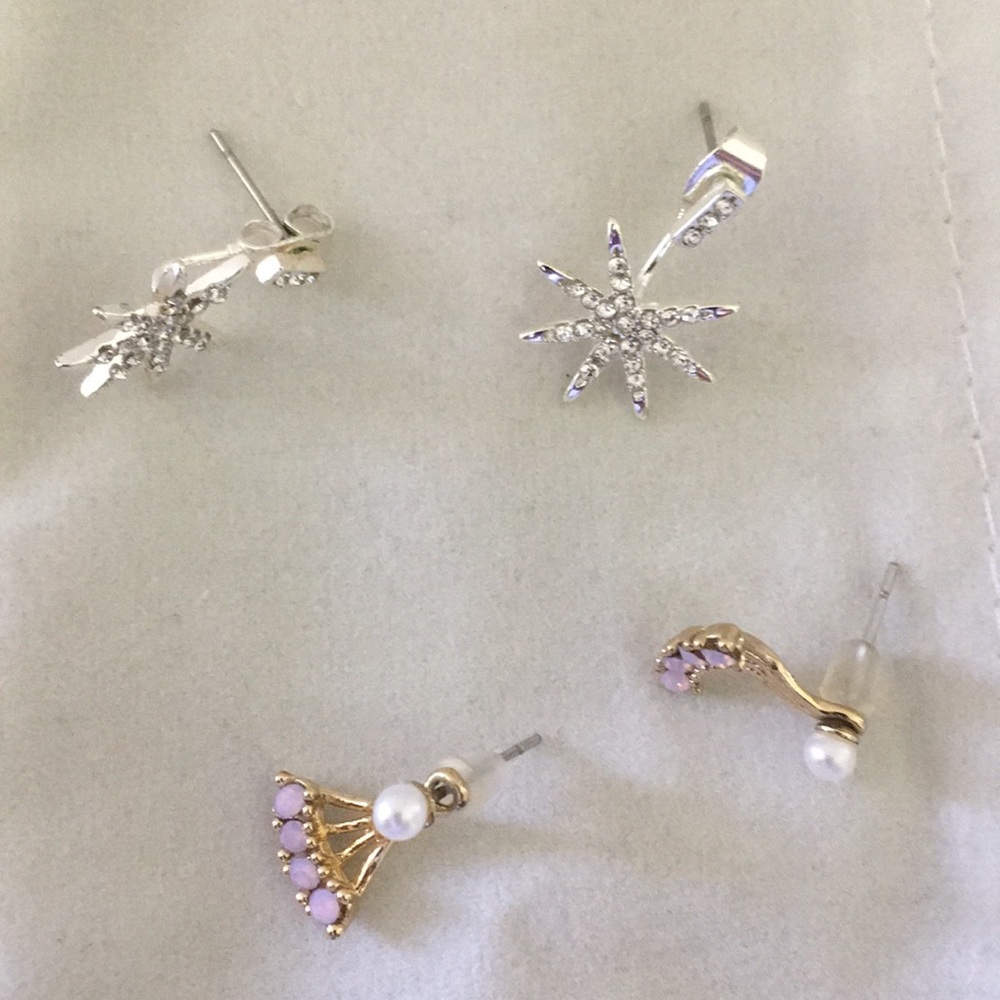 Two pairs of earrings- 1 silver tone and 1 gold